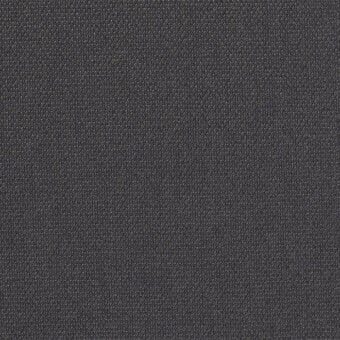 Kvadrat Steelcut Trio fabric sample, dark gray woven textile, close-up of looped surface with material identification text.